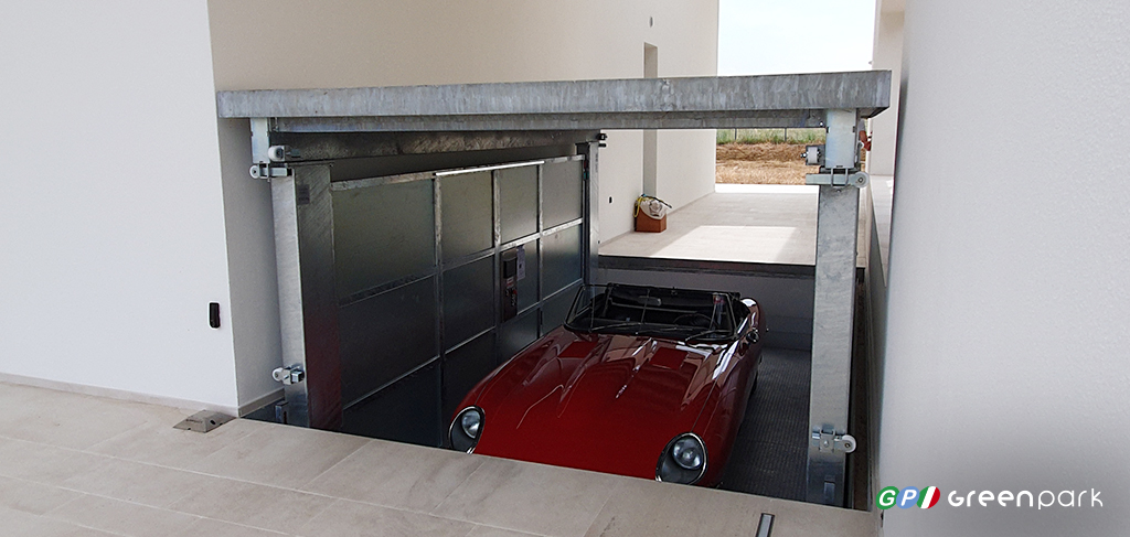 ascensore per auto lift car p1s reggio emilia romagna jaguar tetto di copertura green park carpenedolo brescia